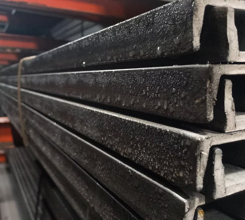 Bundles of high-quality Noble Steel channels stacked in an industrial setting